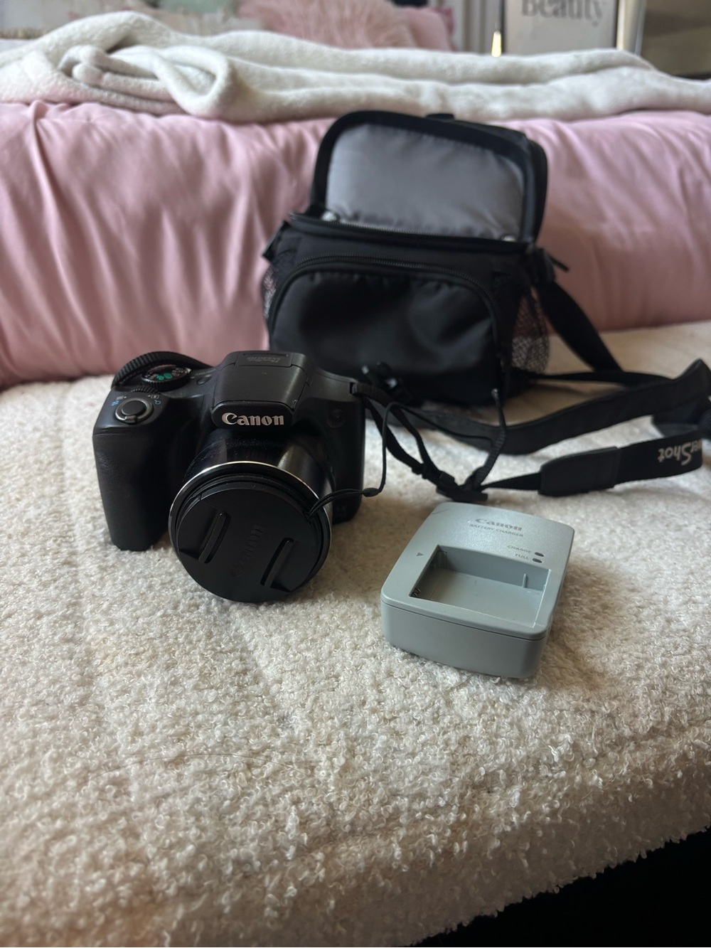 Canon Black Digital Bridge Camera with Black Carry Case and Gray Charger